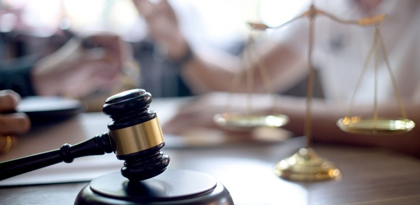 scale and gavel on table