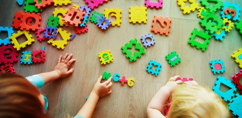 kids playing with puzzle, learning numbers and shapes, education